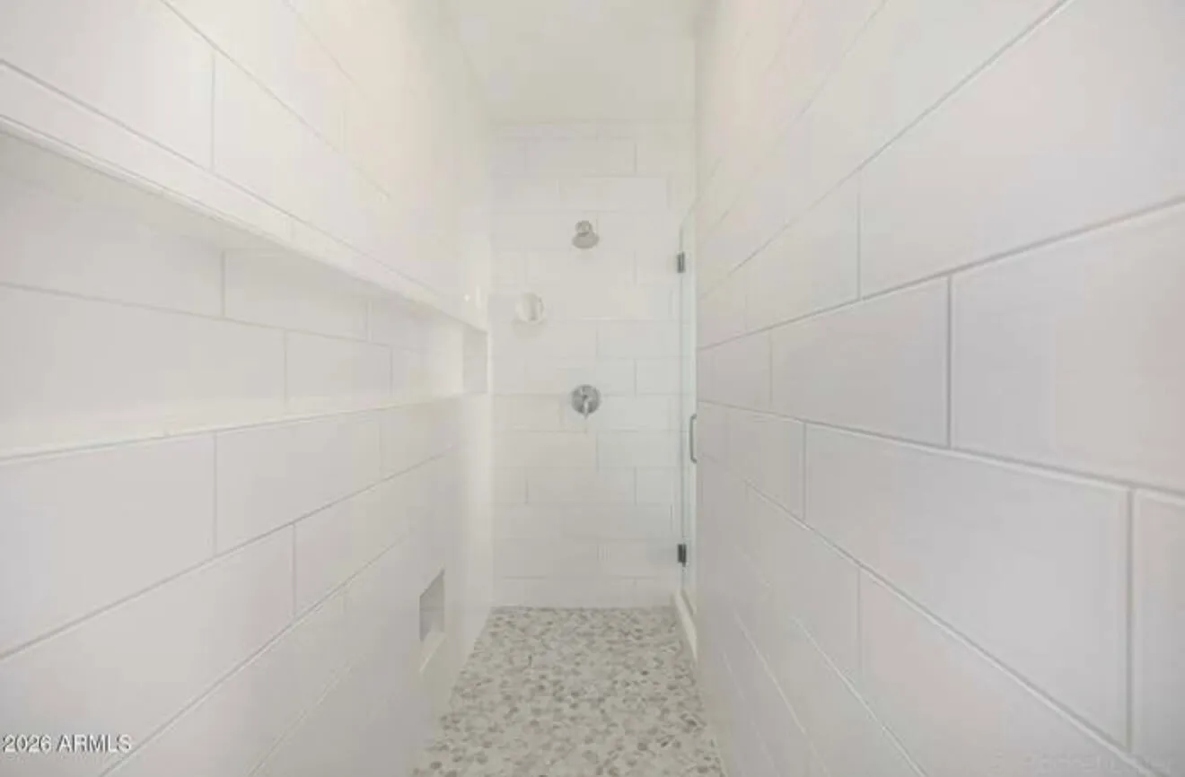 Clean shower tile detail after bathroom cleaning