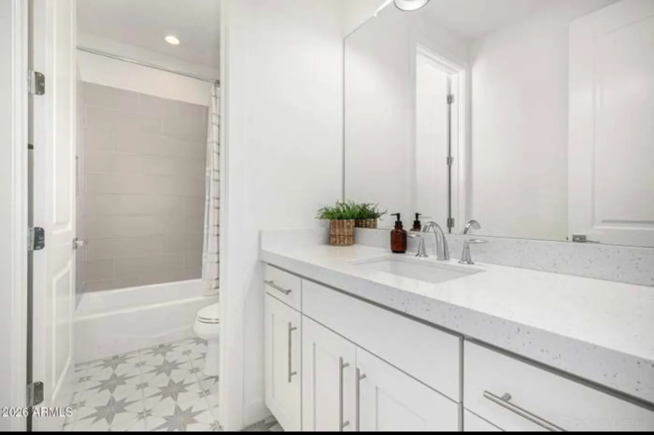 Clean bathroom vanity and tub after service