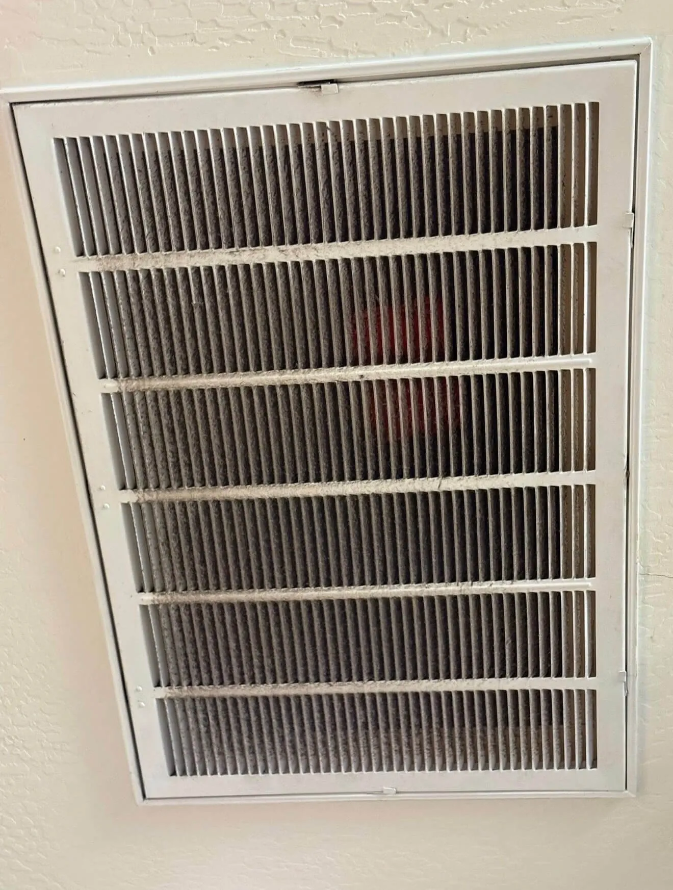 Dusty air vent before cleaning
